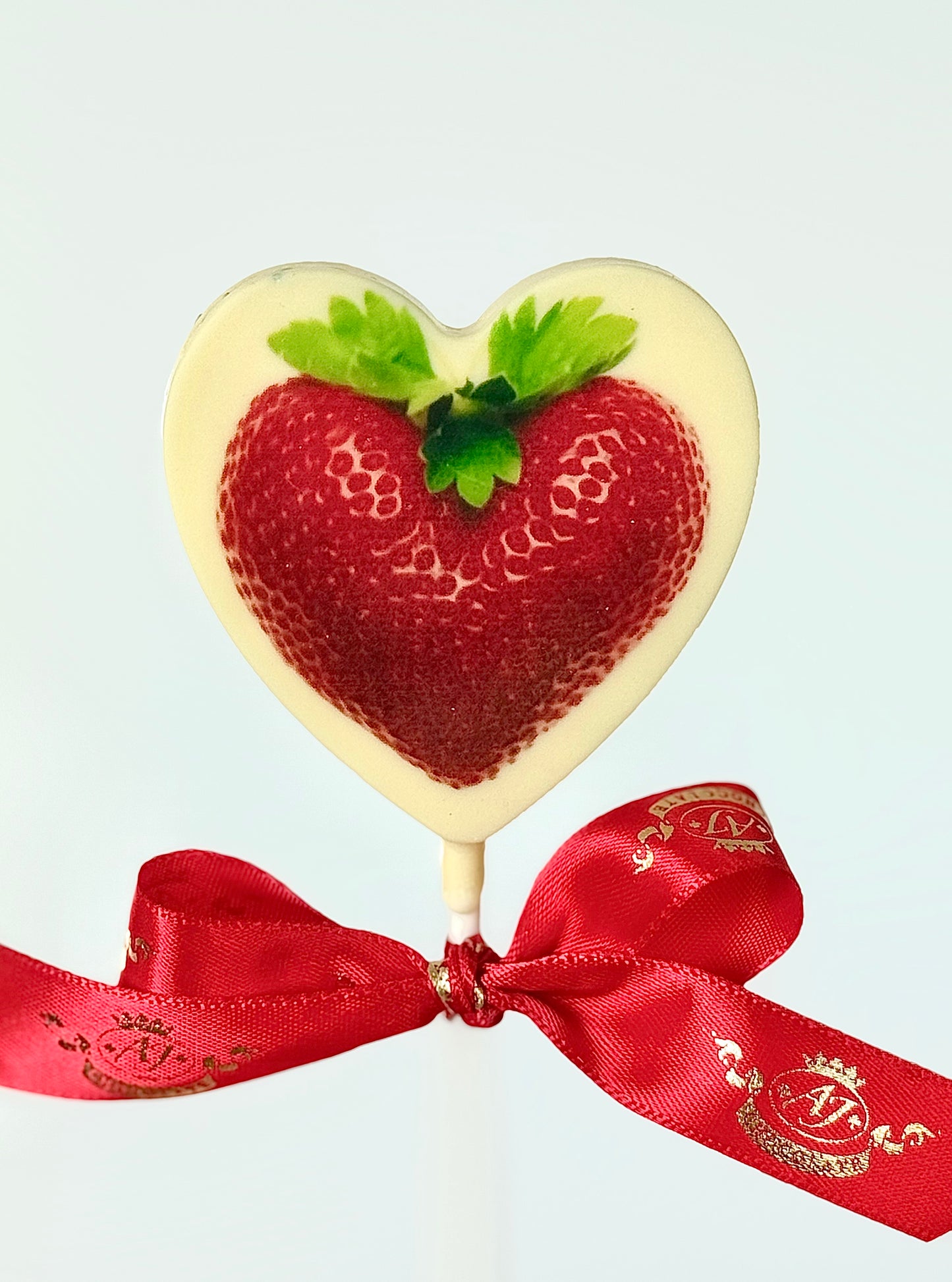 Balto šokolado "Širdelė" ant pagaliuko