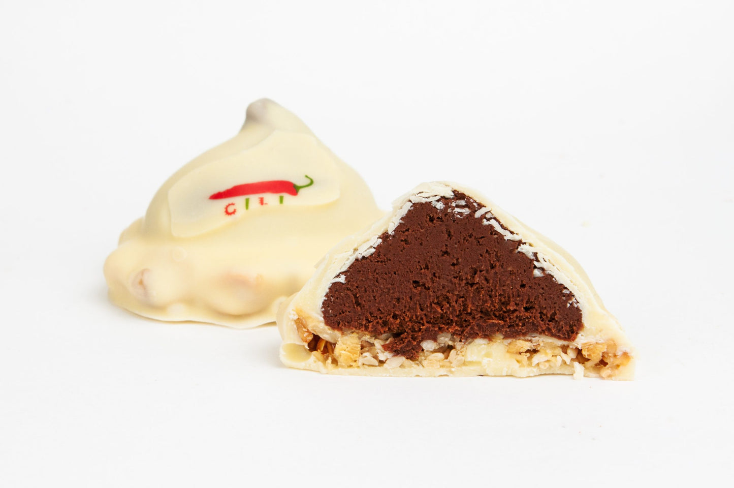 Baltās šokolādes konfektes "Čili tornis" 16 g. Preces Nr. 0013 (100 g.)
