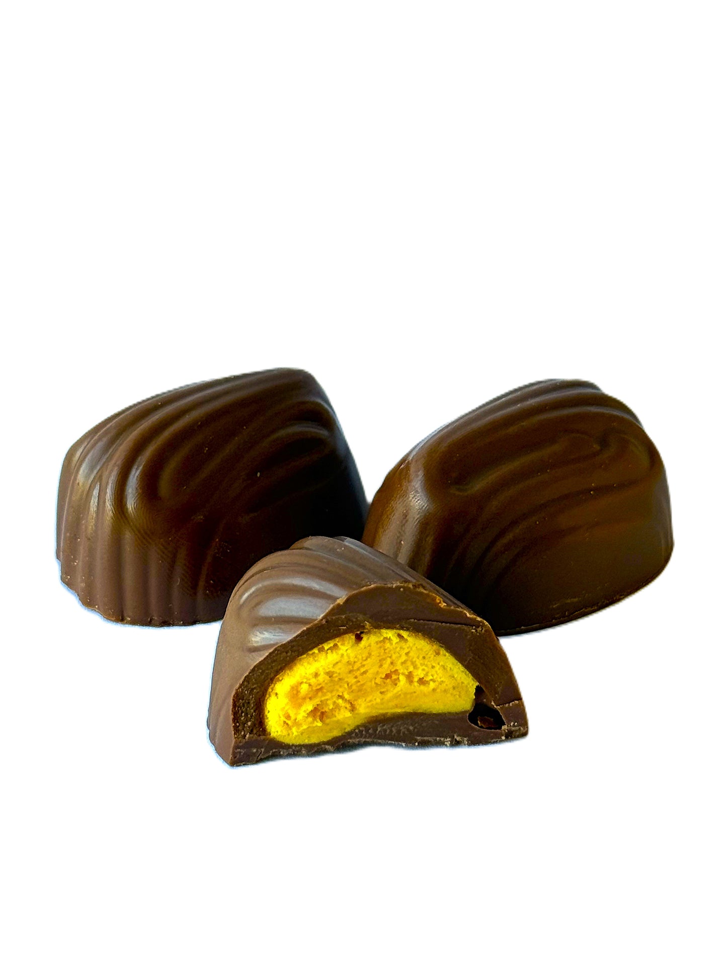 Pieniško šokolado saldainiai su mango įdaru