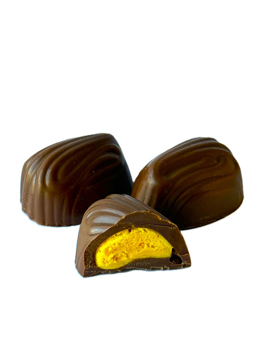 Pieniško šokolado saldainiai su mango įdaru